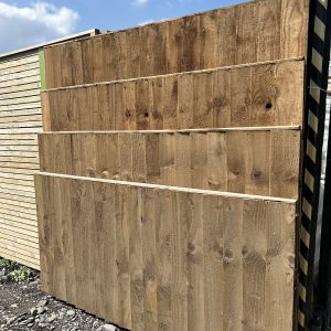 Vertical close board fence panel tantalized brown
